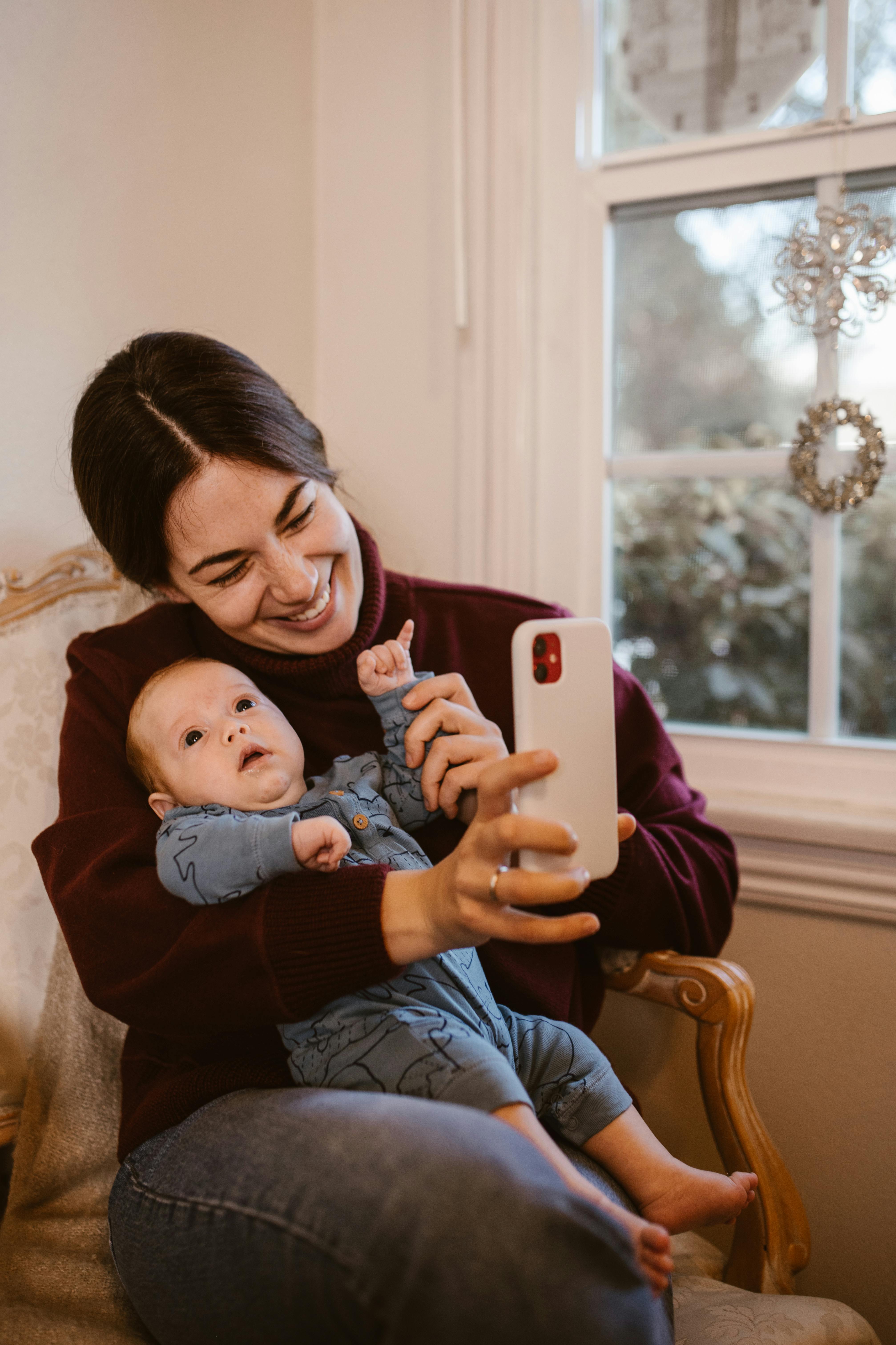 Parent communicating with childcare by phone